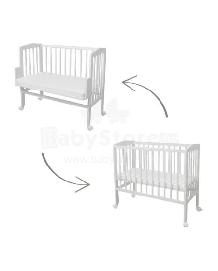 Waldin  Bedside Crib 2in1 Art.297550 White Koka 2-in-1 bērnu gultiņa/šūpulis uz riteņiem ar matraci