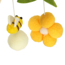 Ikonka Art.KX4590 Cot carrousel plush pendants flowers yellow
