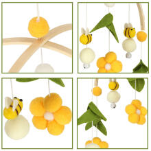 Ikonka Art.KX4590 Cot carrousel plush pendants flowers yellow