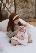 Reborn lelle ar rozā apģērbu, 40 cm
