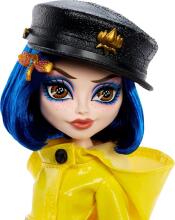 Monster High Skullector Coraline lelle – dzeltenā lietusmētelī